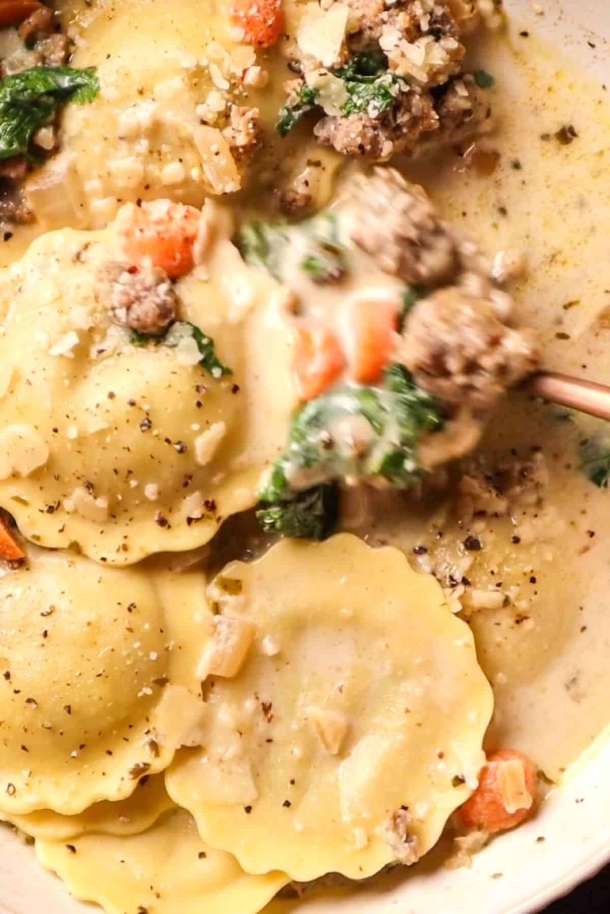 ravioli soup in white bowl