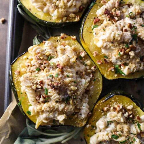 Sage and White Cheddar Mac & Cheese Stuffed Acorn Squash with Chopped Pecans
