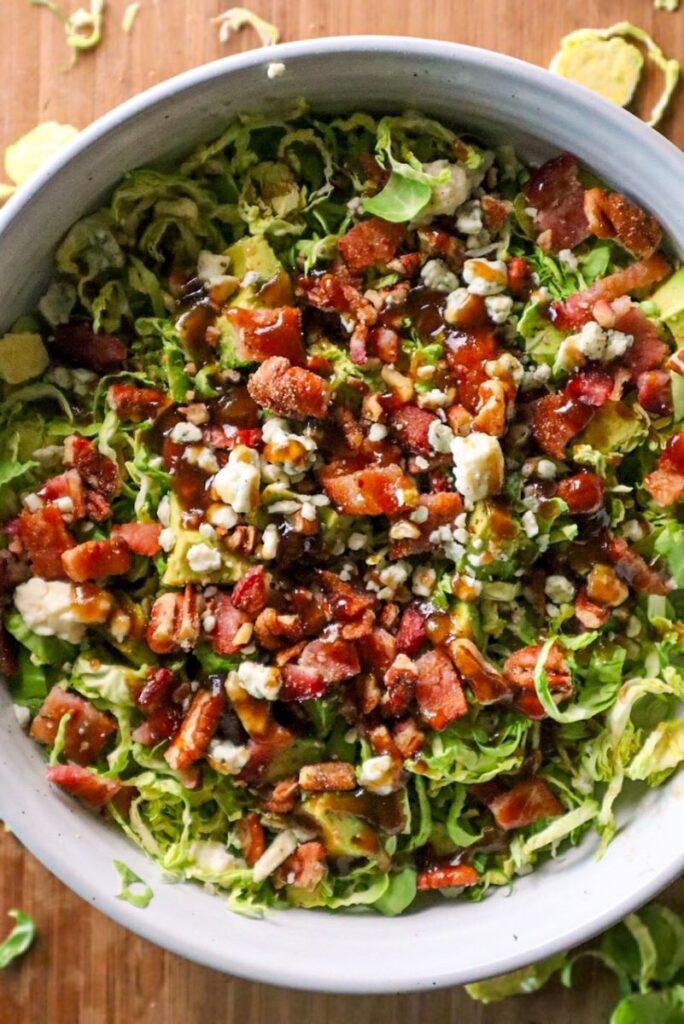 shaved brussels salad with bacon and gorgonzola and fig jam