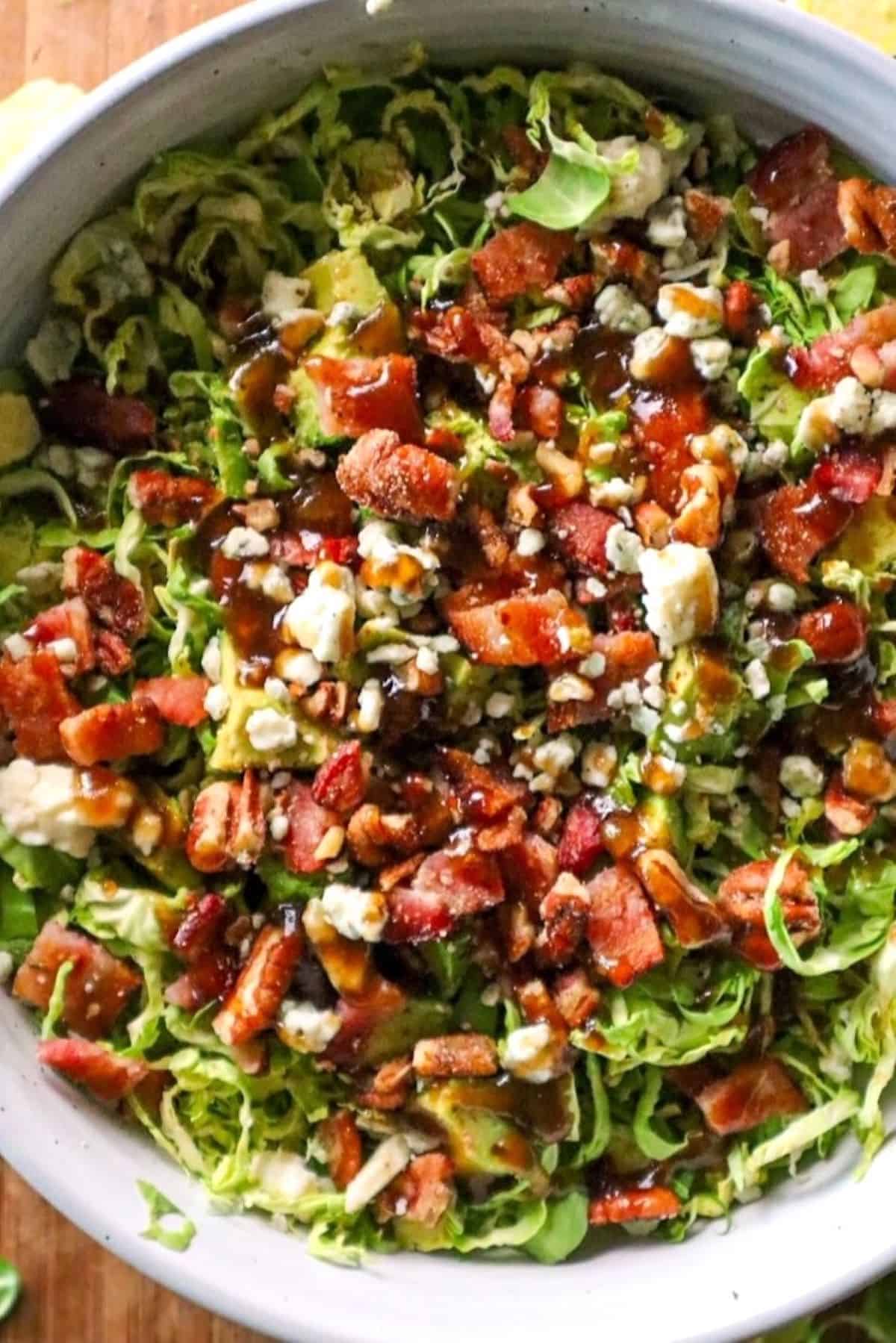 shaved brussels sprout salad with bacon and fig dressing