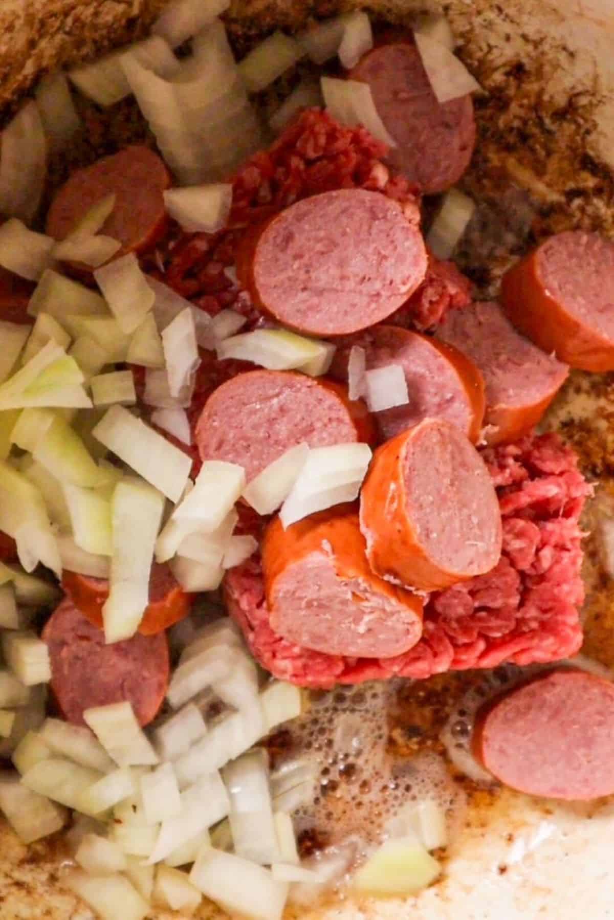 sausage onions and beef for cowboy beans