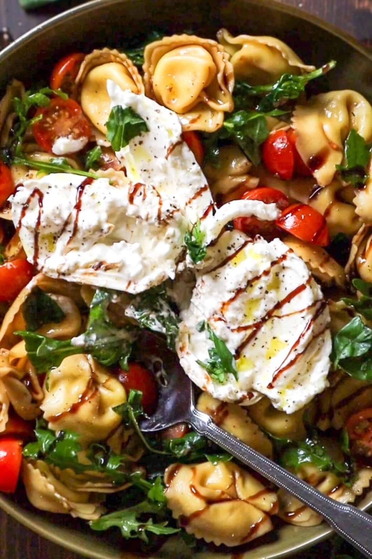 caprese salad with burrata and tortellini