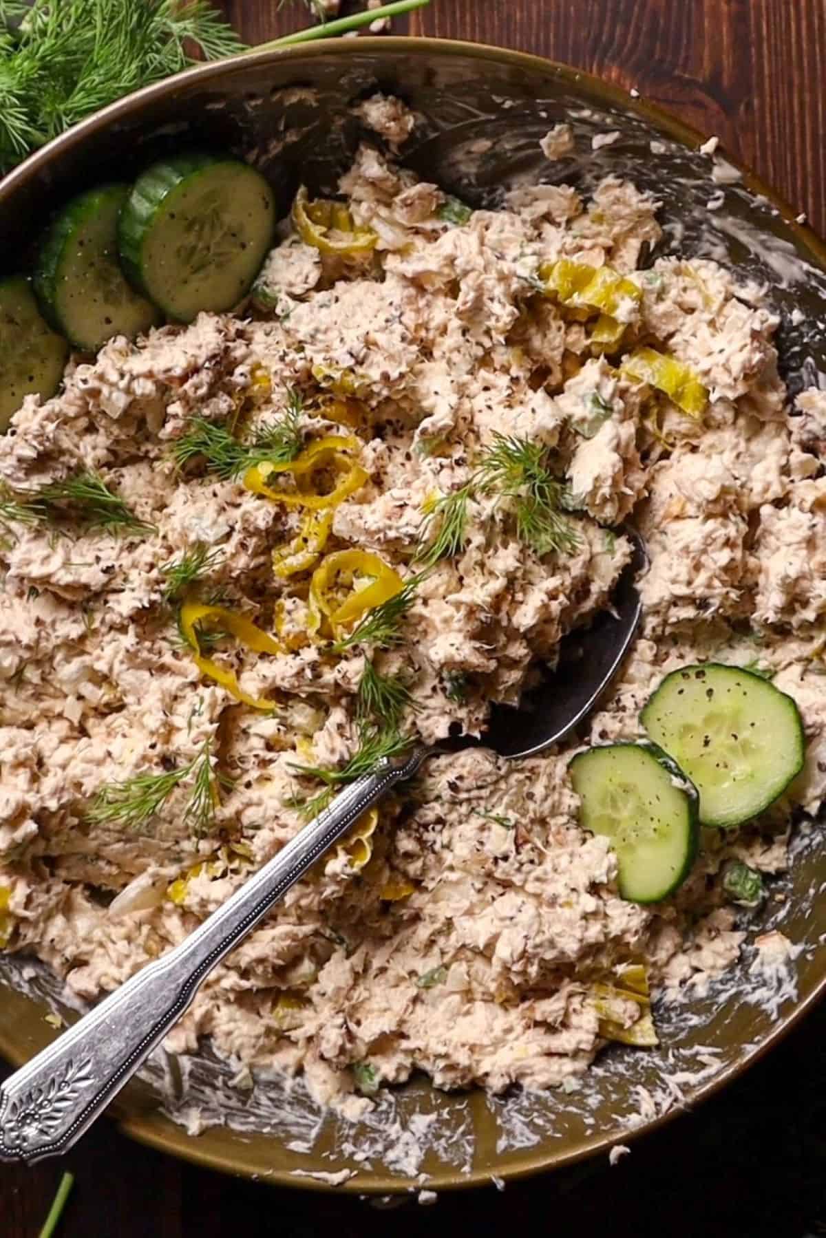 pepperoncini chicken salad plated in green bowl