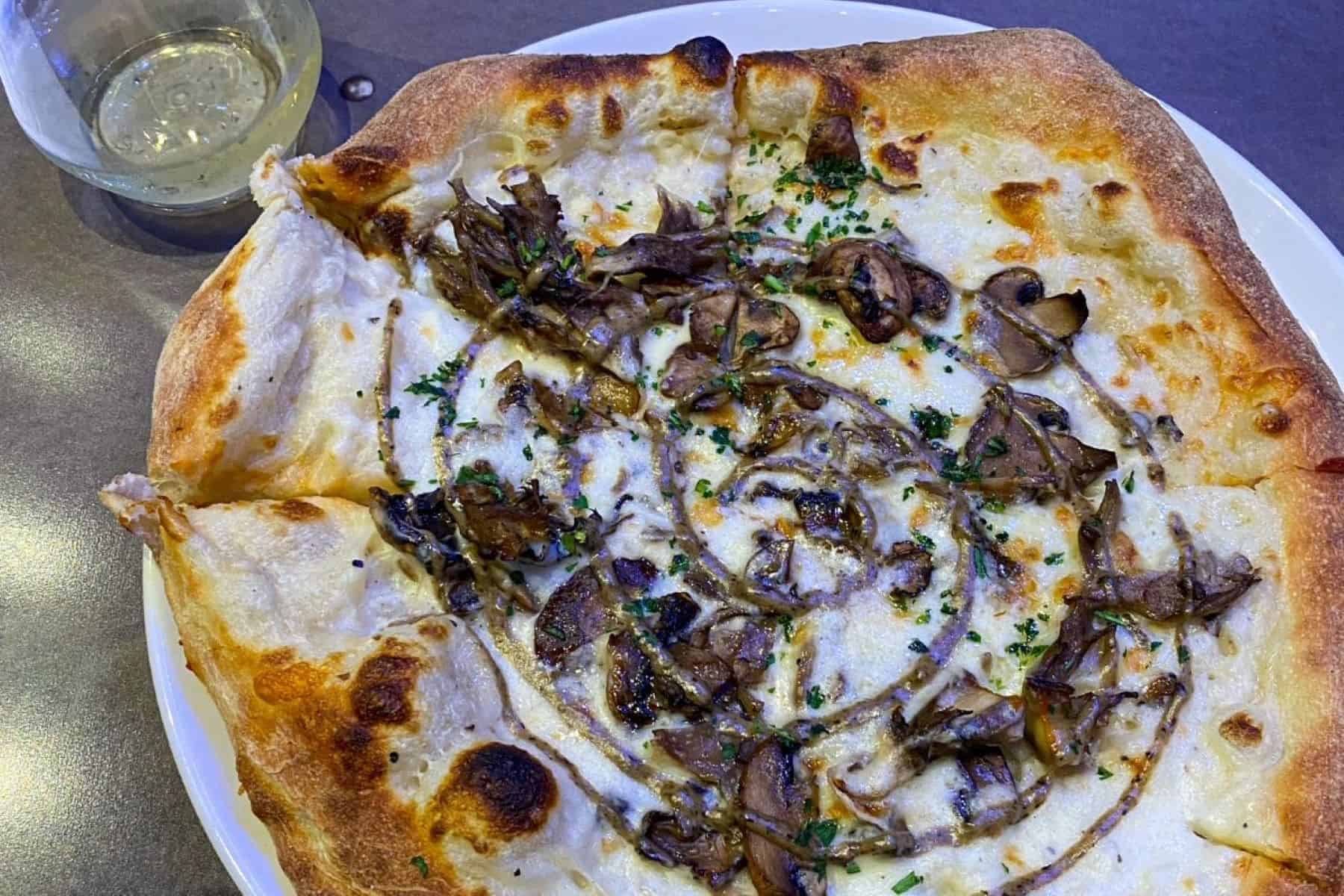 epic universe pizza moon giant mushroom pizza