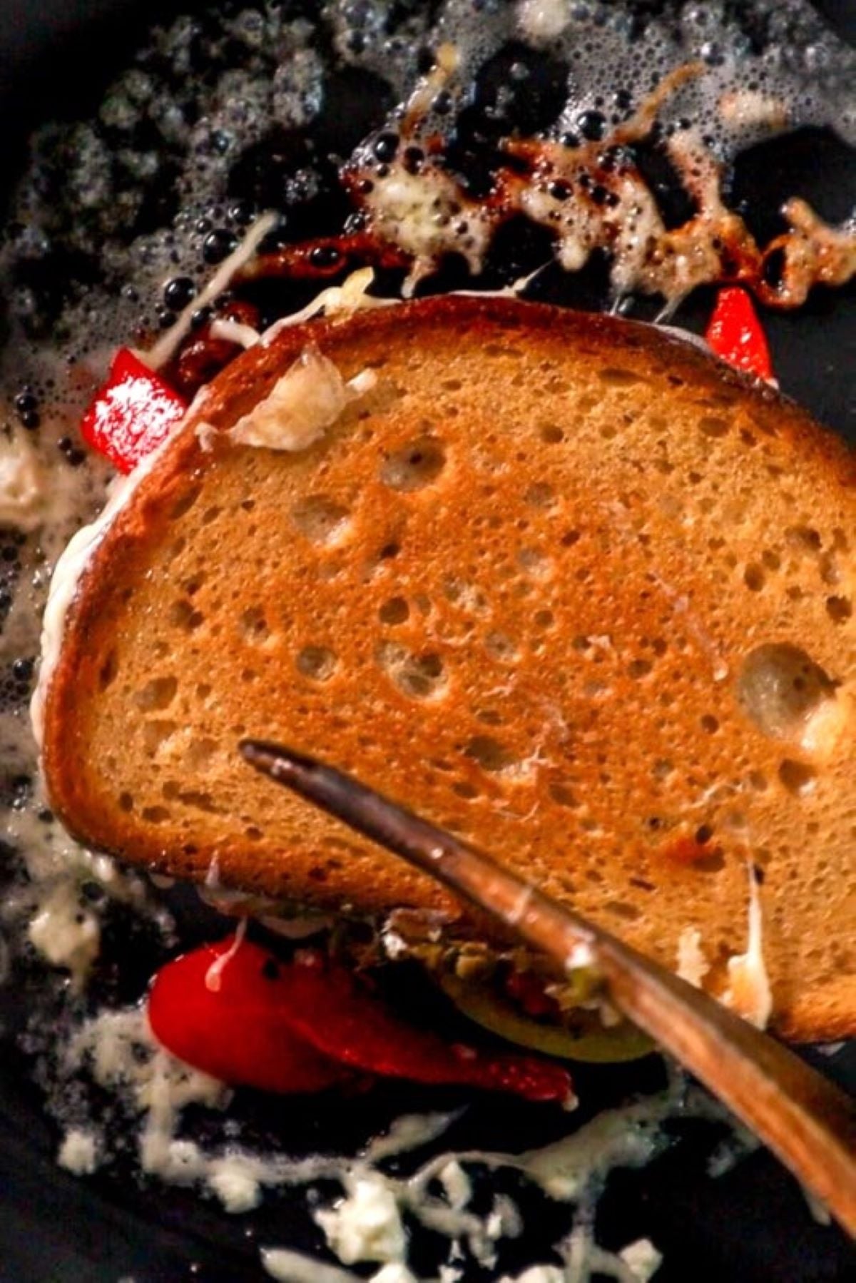 mediterranean grilled cheese in frying pan