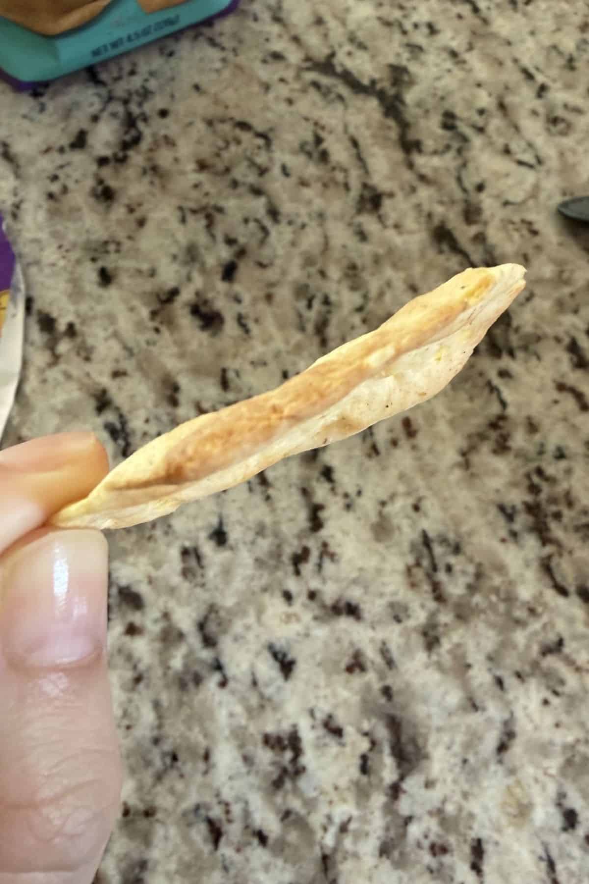 miltons gluten free sea salt crackers side view of cracker