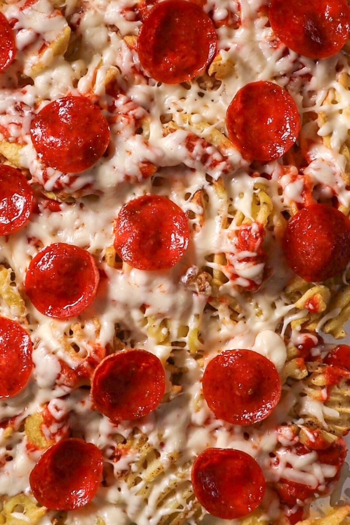 fries with pizza sauce melted cheese and pepperoni