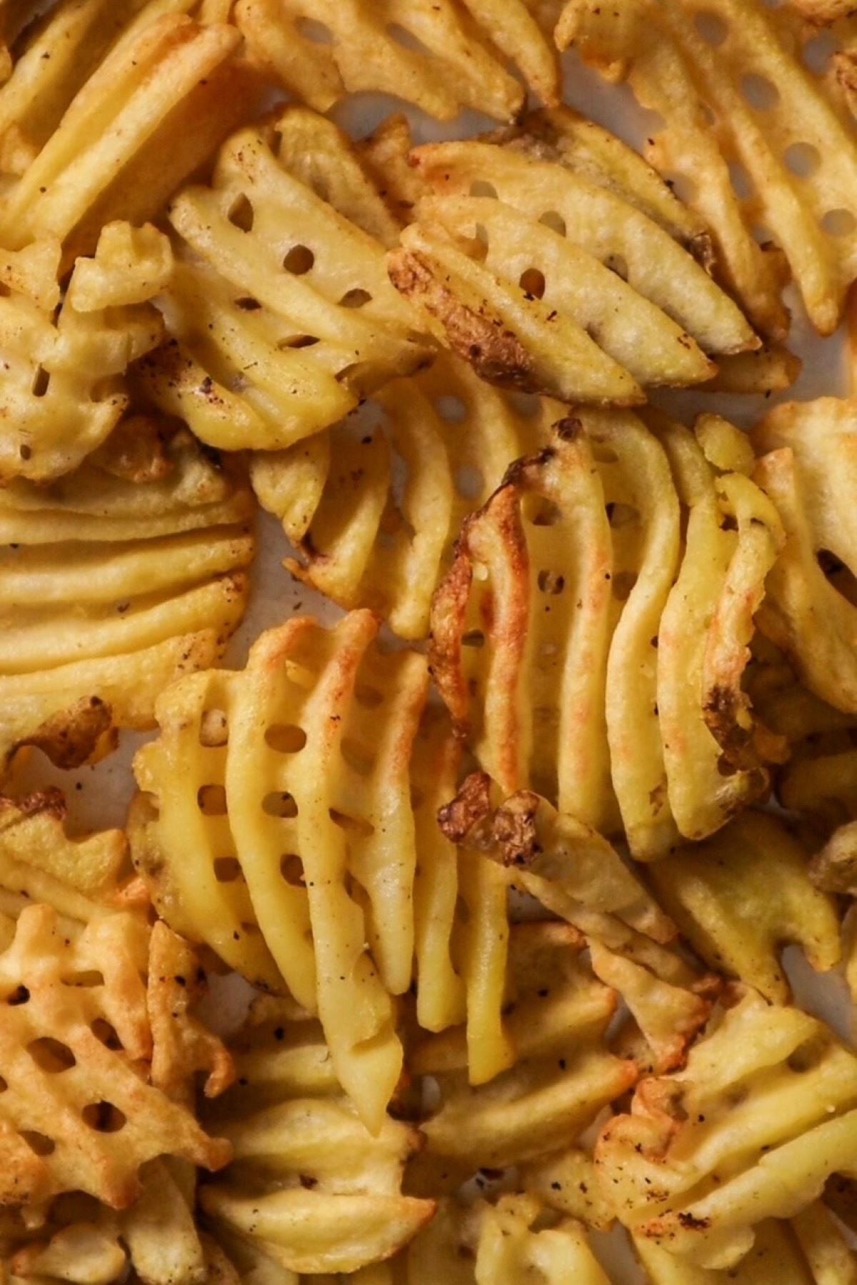 waffle fries on baking sheet